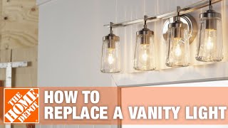 Bathroom Lighting  How to Replace a Vanity Light  The Home Depot [upl. by Mayes]